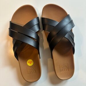 Reef Black and Brown Cross-Strap Sandals -Cushion Spring Bloom